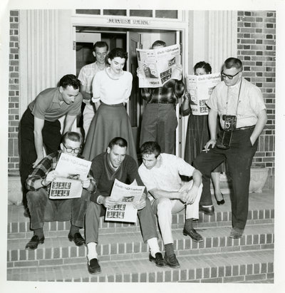 Students reading the Sagebrush student newspaper, antique photo