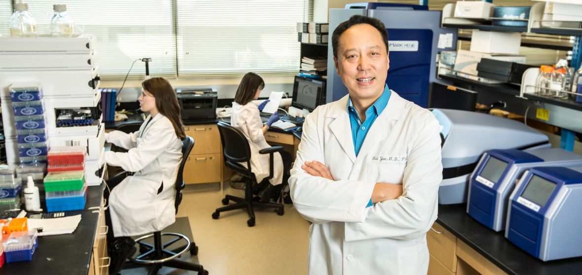 Wei Yan is shown in his laboratory