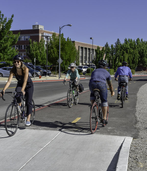 Cyclists using shared pathway on Evans Ave.