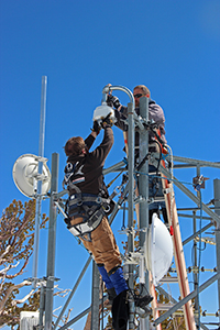 Installing fire camera on Slide Mountain overlooking Lake Tahoe and the Reno, Carson City area