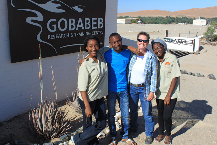 Researchers in Namibia pose for a photo