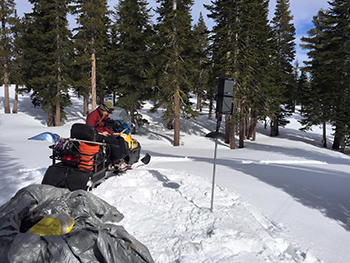 Angela Pitera conducts chickadee science from a snowmobile