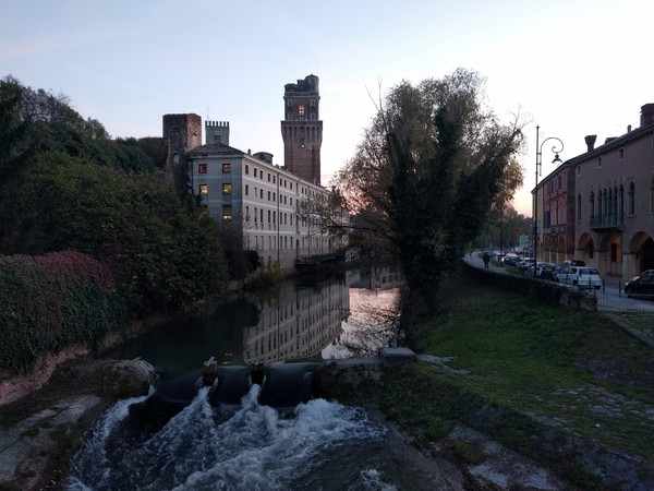 La Specola, the canal, and porticoed sidewalks in Padova