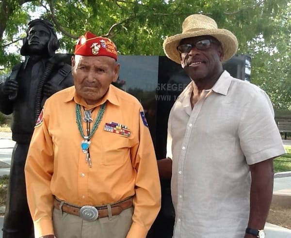 Ben Hazard with Code Talker in front of memorial