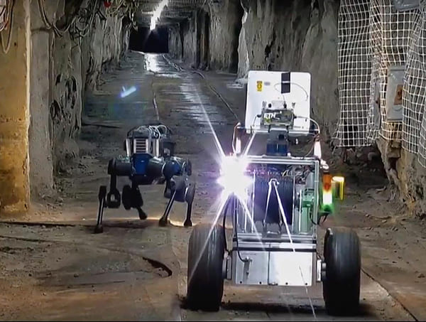 DARPA Subterranean Challenge robots in a tunnel