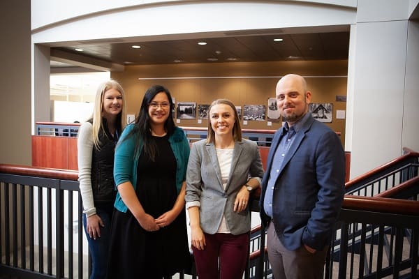 From L to R: Student Assistant, Taylor Kunze; Digitization Lab Manager, Katherine Dirk; Head of Metadata and Cataloging, Emily Boss; and Head of Digital Services, Nathan Gerth.