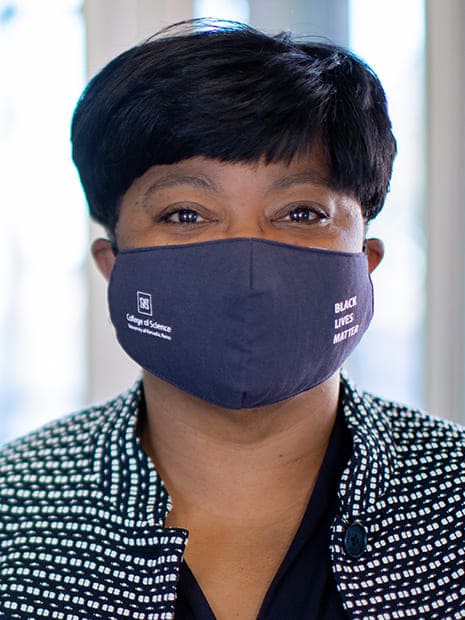 Portrait of Melanie Duckworth wearing a College of Science Black Lives Matter face covering.