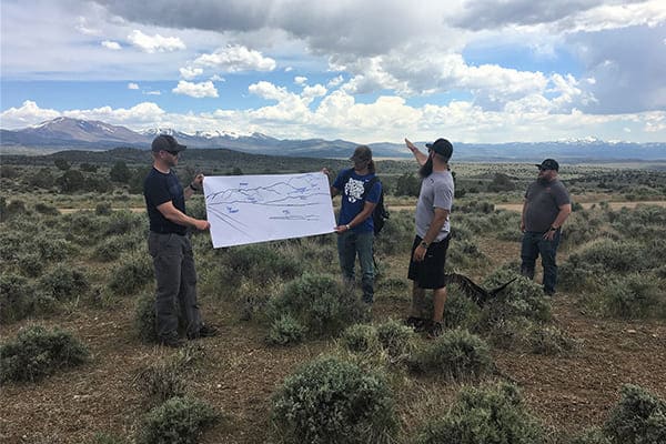 Students critique a land's management.