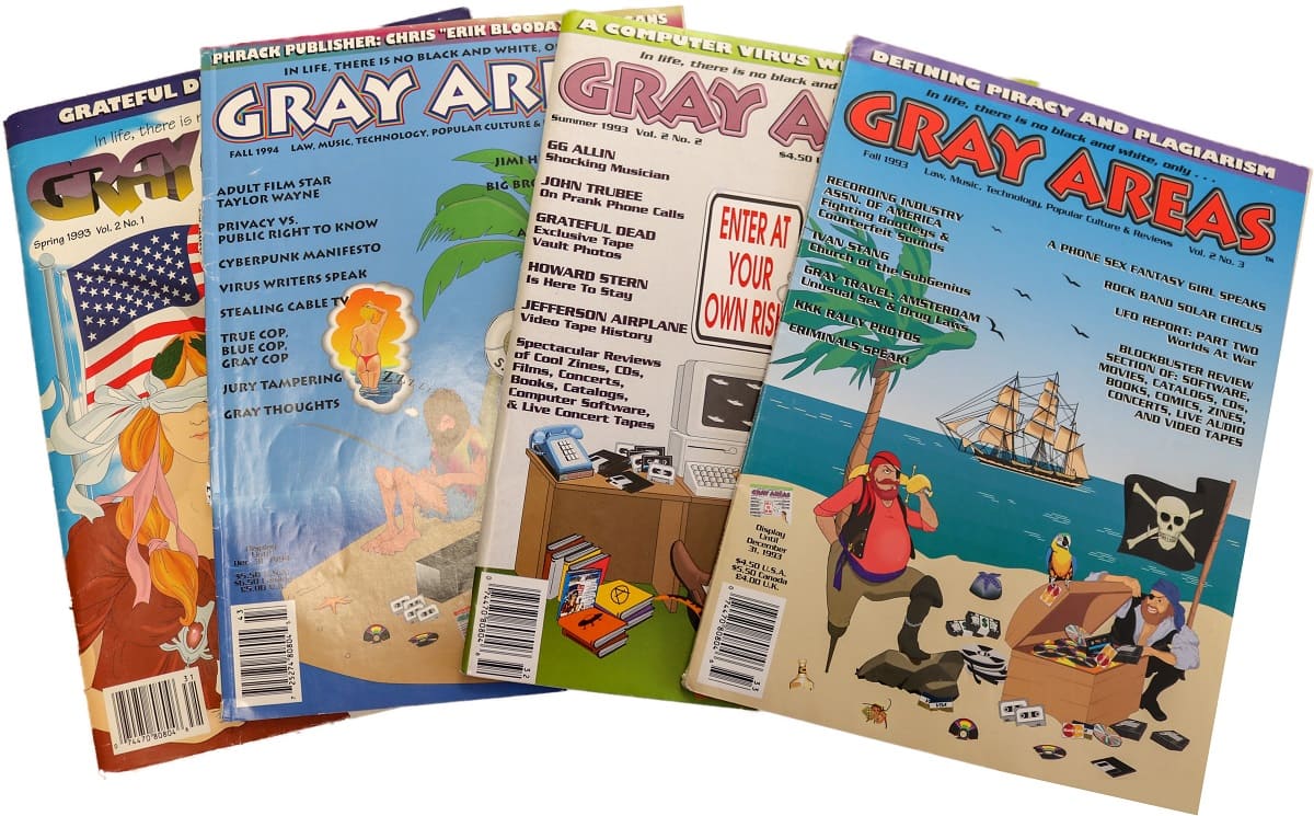 Four “Gray Areas” magazines spread out on a table featuring cartoon artwork