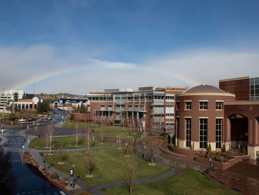 The Knowledge Center with a rainbow over it