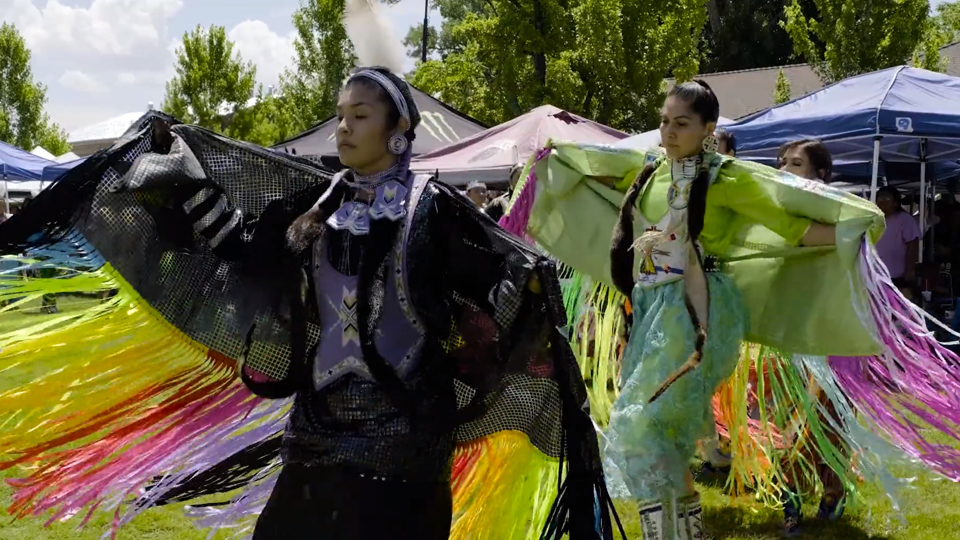A traditional Paiute dance being done by dancers in full regalia