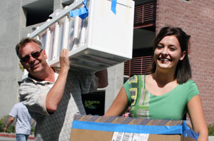 Father helping student move in