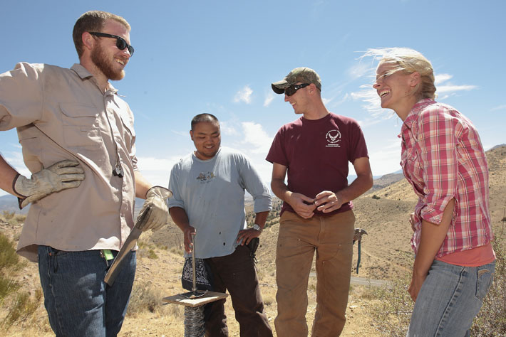 Mackay students laughing at an abandoned mine