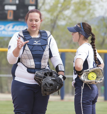 Amanda Nicholas giving advice to a teammate 