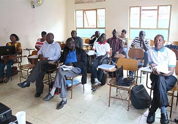 Makoba with graduates at UTAMU