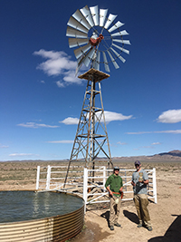 Graduate students sample well water for geothermal project