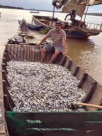 Zeb Hogan on the Tonle Sap River in Cambodia during launch of the Wonders of the Mekong research and conservation project.