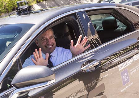Governor Sandoval arrives to University of Nevada, Reno campus in an autonomous vehicle demonstrating "no hands" needed behind the wheel