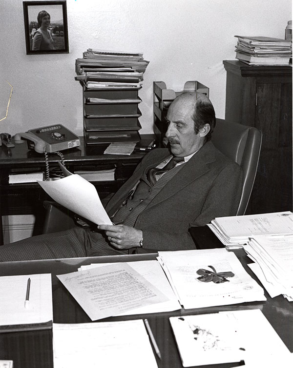 Joe Crowley working hard at his desk in the early years