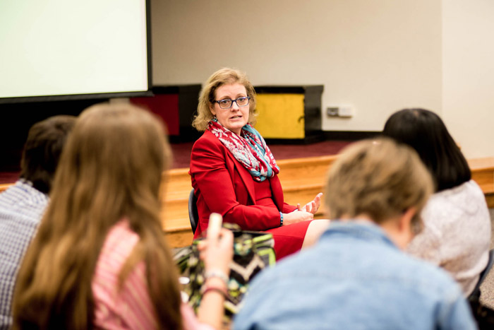 Julie Robinson speaks to students in a classroom