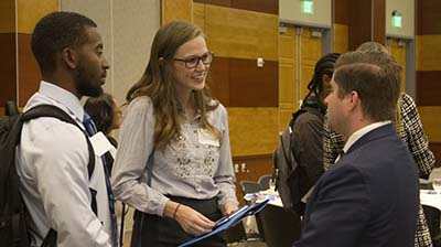 Liberal Arts students networking prior to the event