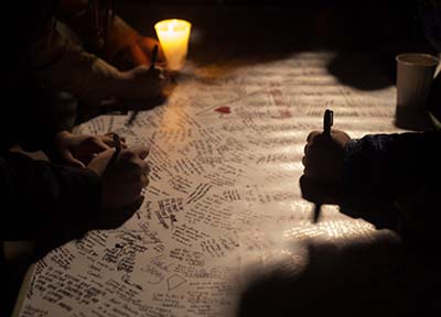 Candlelight Vigil Banner with signatures