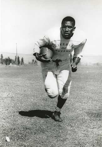 Sherwin Howard running with a football