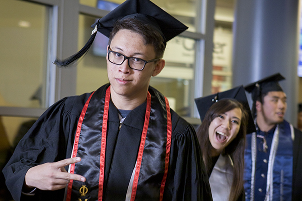 Graduates having fun at the Asian American & Pacific Islander Graduate Celebration