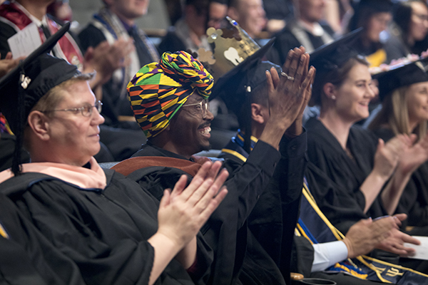 Graduates applaud at the Lavender Graduate Celebration