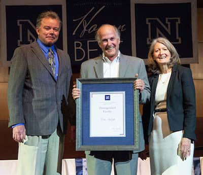 Kevin Carman, Eric Herzik and Shannon Ellis pose for a photos at the Honor the Best ceremony