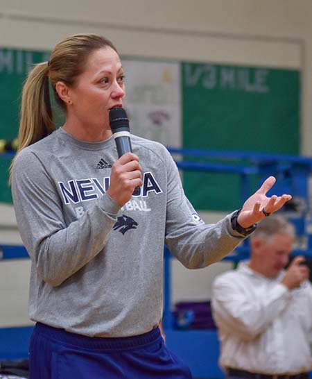 Wolf Pack Women's Basketball Coach Amanda Levens address the Clayton Middle School student body