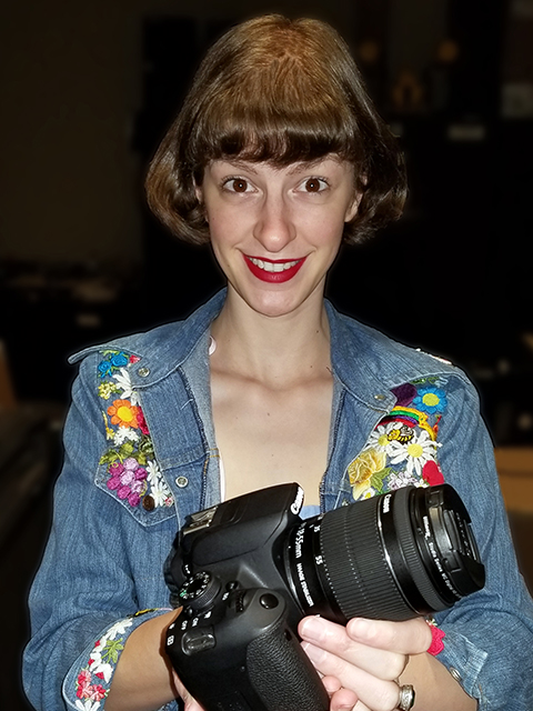 Hannah Huntley holding a camera