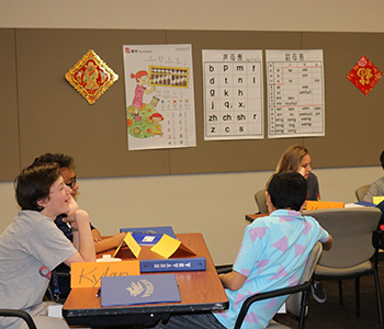 Students study and learn Chinese in Chinese-decorated classroom