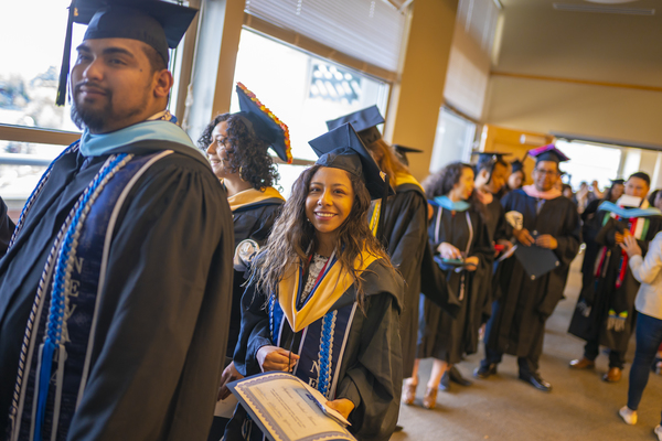 Graduates posing at the Latinx Graduate Celebration