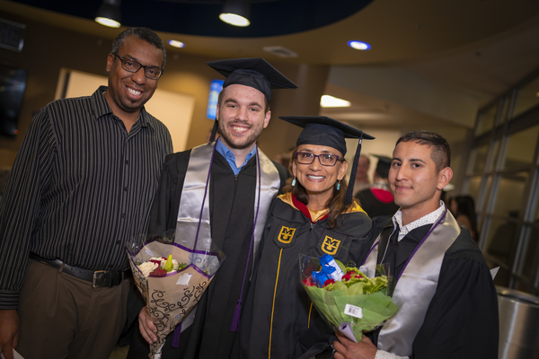 Graduates posing at the Lavender Graduate Celebration