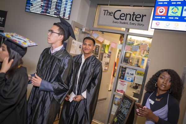 Graduates applaud at the Lavender Graduate Celebration