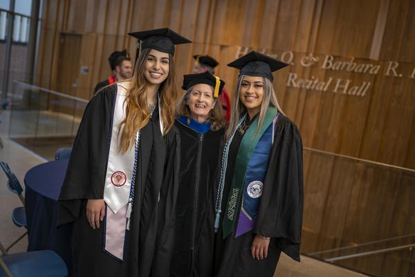 Graduates posing at the Lavender Graduate Celebration