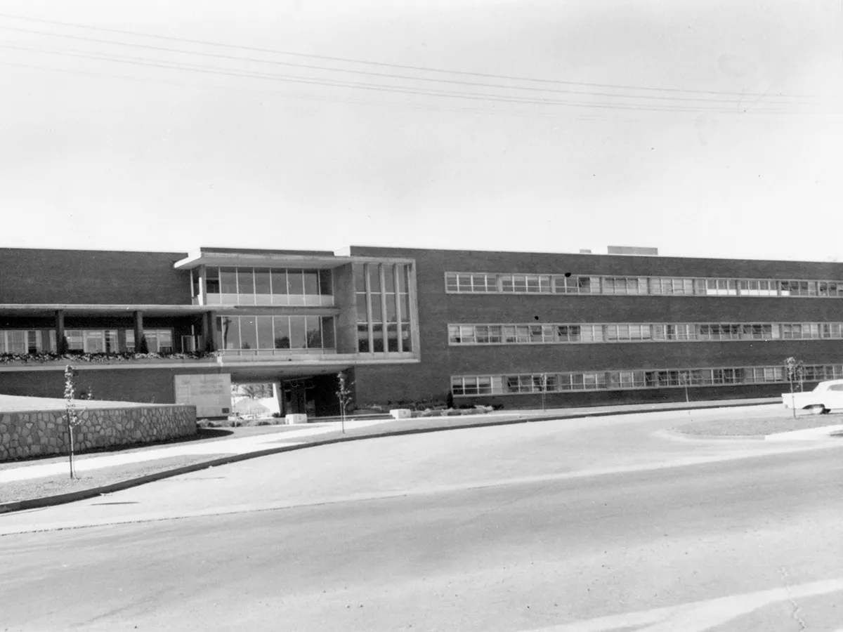 This black and white photo from 1958 shows the front of the Max C. Fleischmann Building on the University of Nevada, Reno campus.