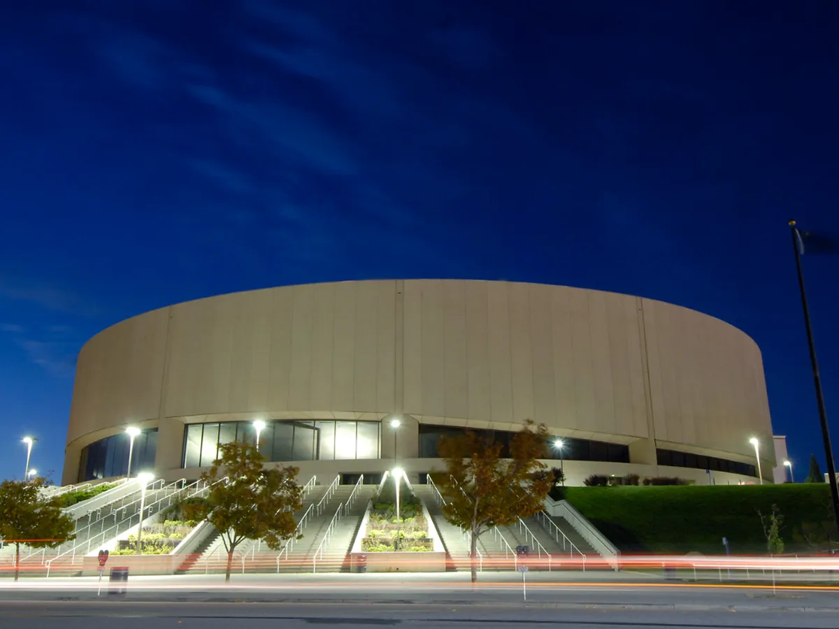 Lawlor Events Center is illuminated during the evening.