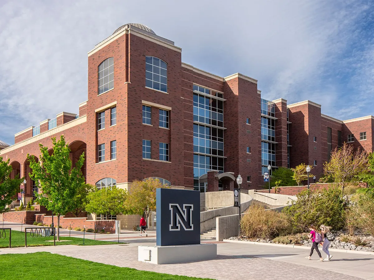 This 2021 photo shows the southeast position of the Mathewson-IGT Knowledge Center and the block N statue in front of the building.