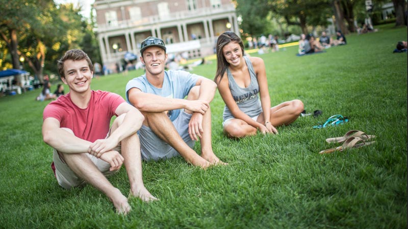 students sitting on the quad