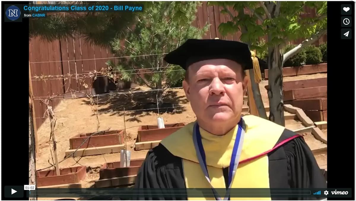 Dean Payne in graduation robes