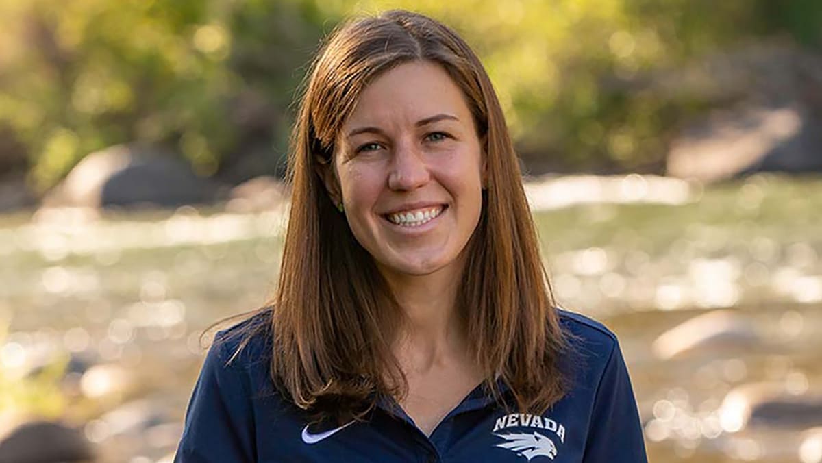 Joanna Blaszczak smiling with a river running in the background