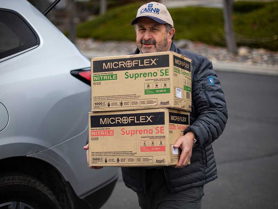 Chris Pritsos delivering personal protective equipment supplies