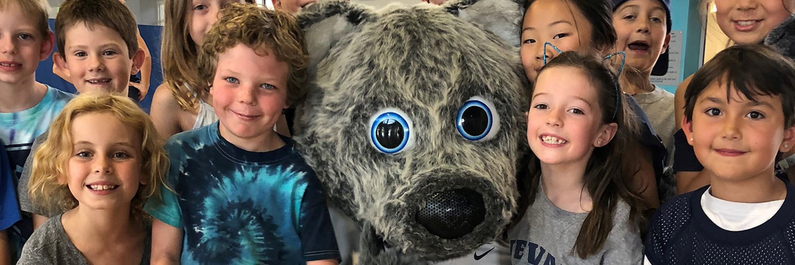 Children with University of Nevada, Reno mascot.