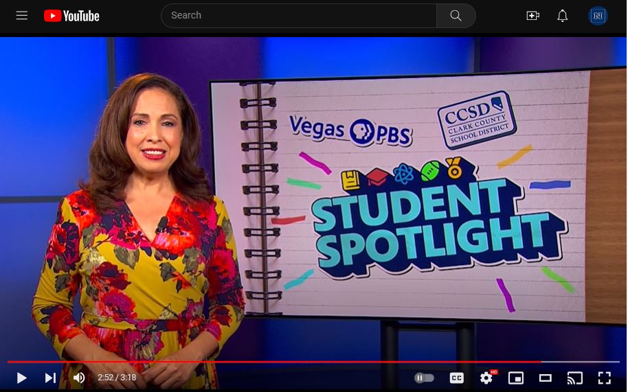 Screenshot of a clip from the Vegas PBS Student Spotlight on Extension's Youth Horticulture Education Program. In the clip, the show's anchor is in the studio, smiling next to a digital display featuring the Student Spotlight, Vegas PBS and Clark County School District logos.