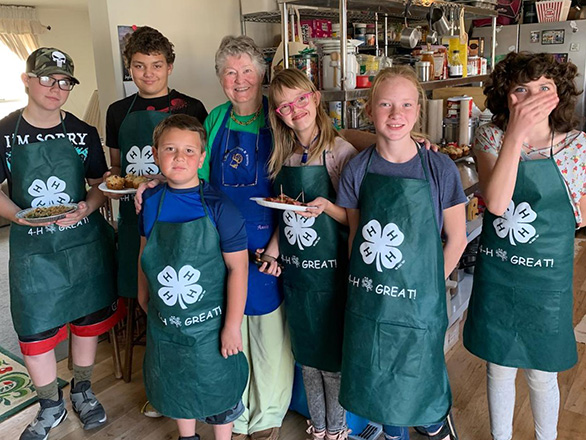 Six 4-H youth showing snacks they made