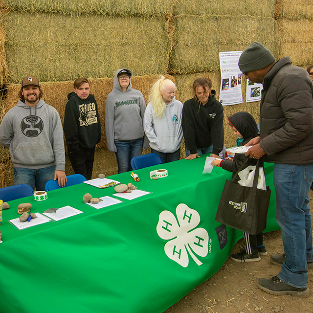 Child getting a 4-H sticker