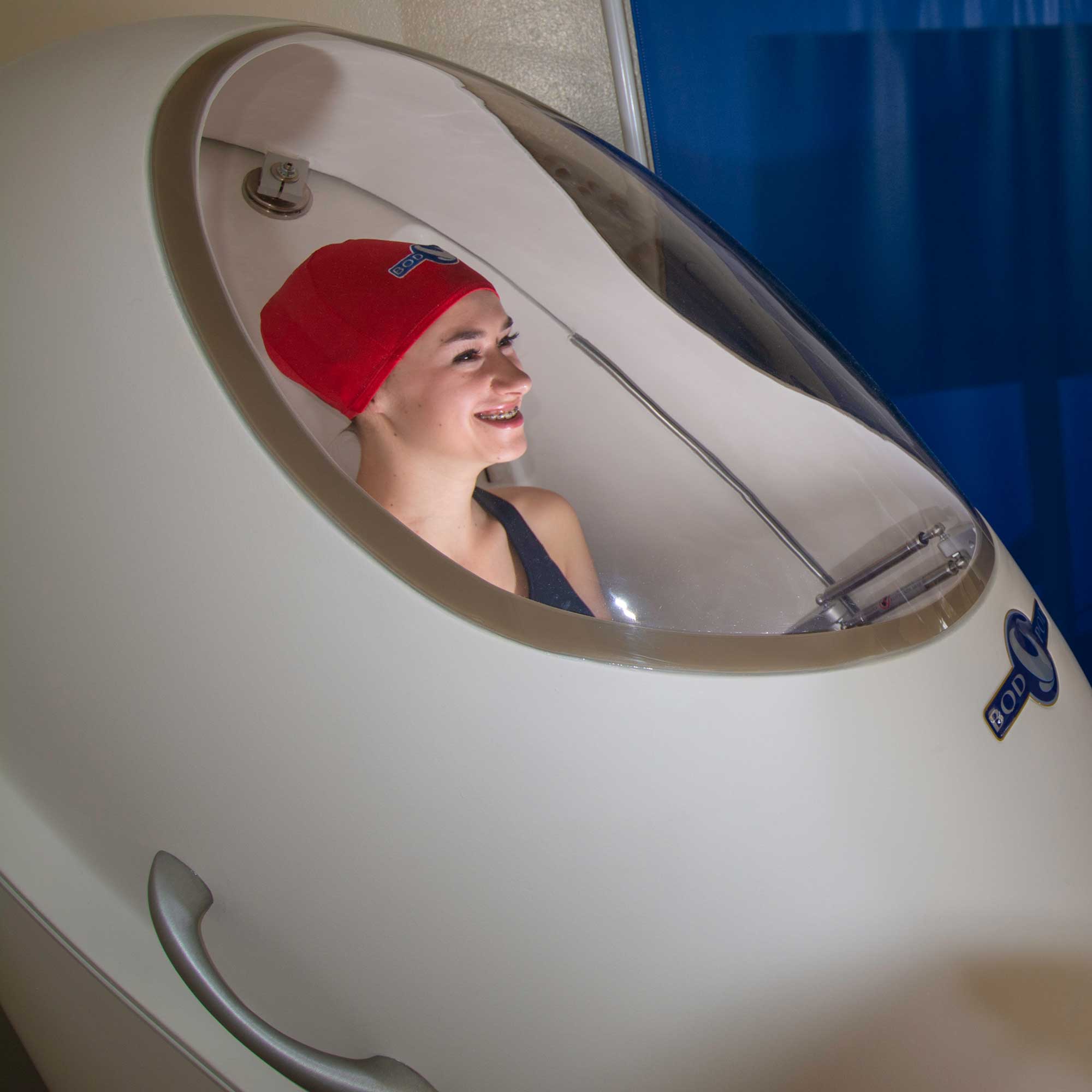 Woman in bod pod