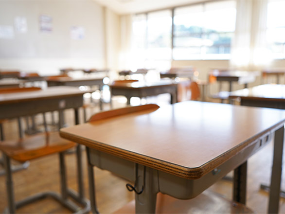 Photo of empty desks in a classroom